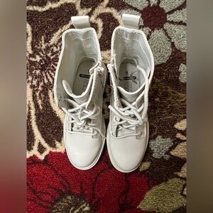 82. Women’s White Combat Boots